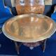 Very large coffee table with bronze top and chiseled decor, 100 cm