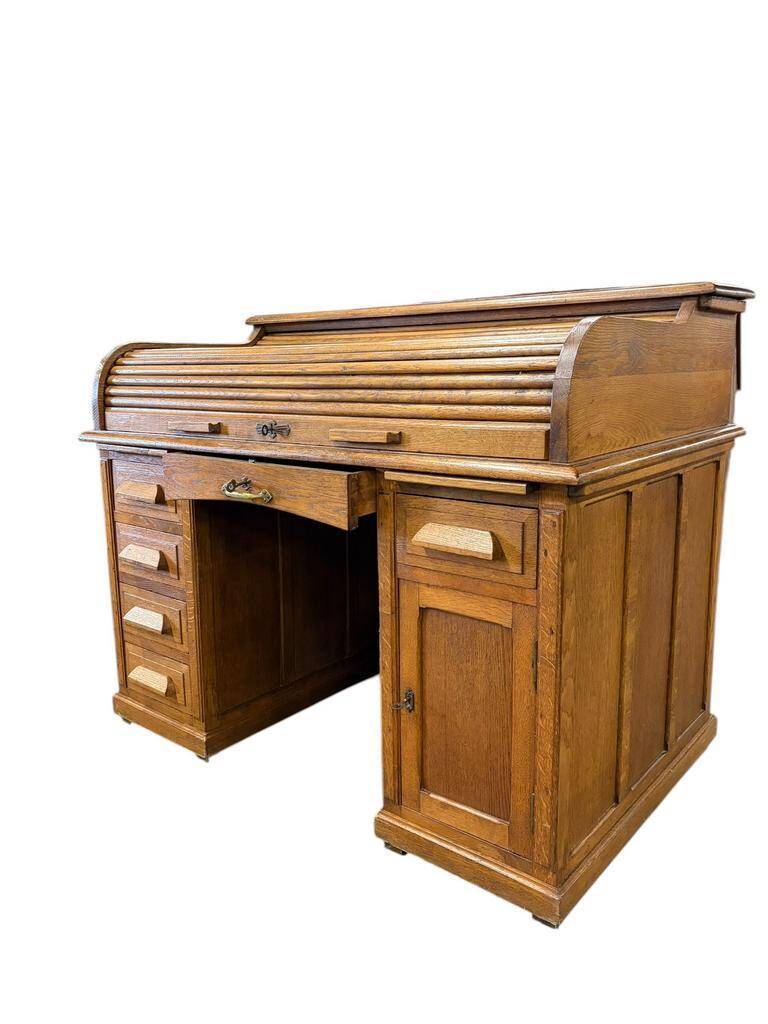 Vintage American desk made of solid wood with a curtain.