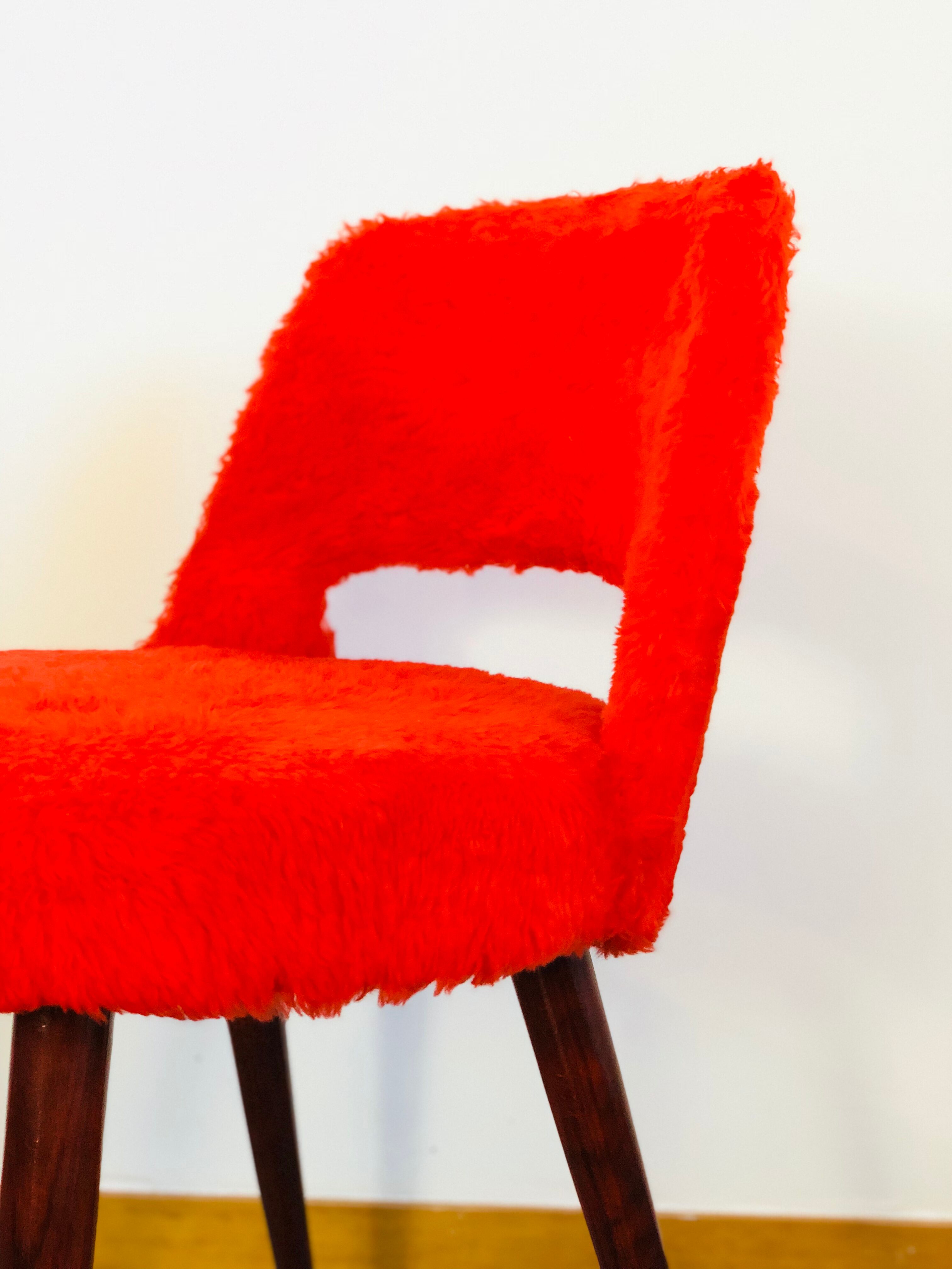 Pair of chairs red rug