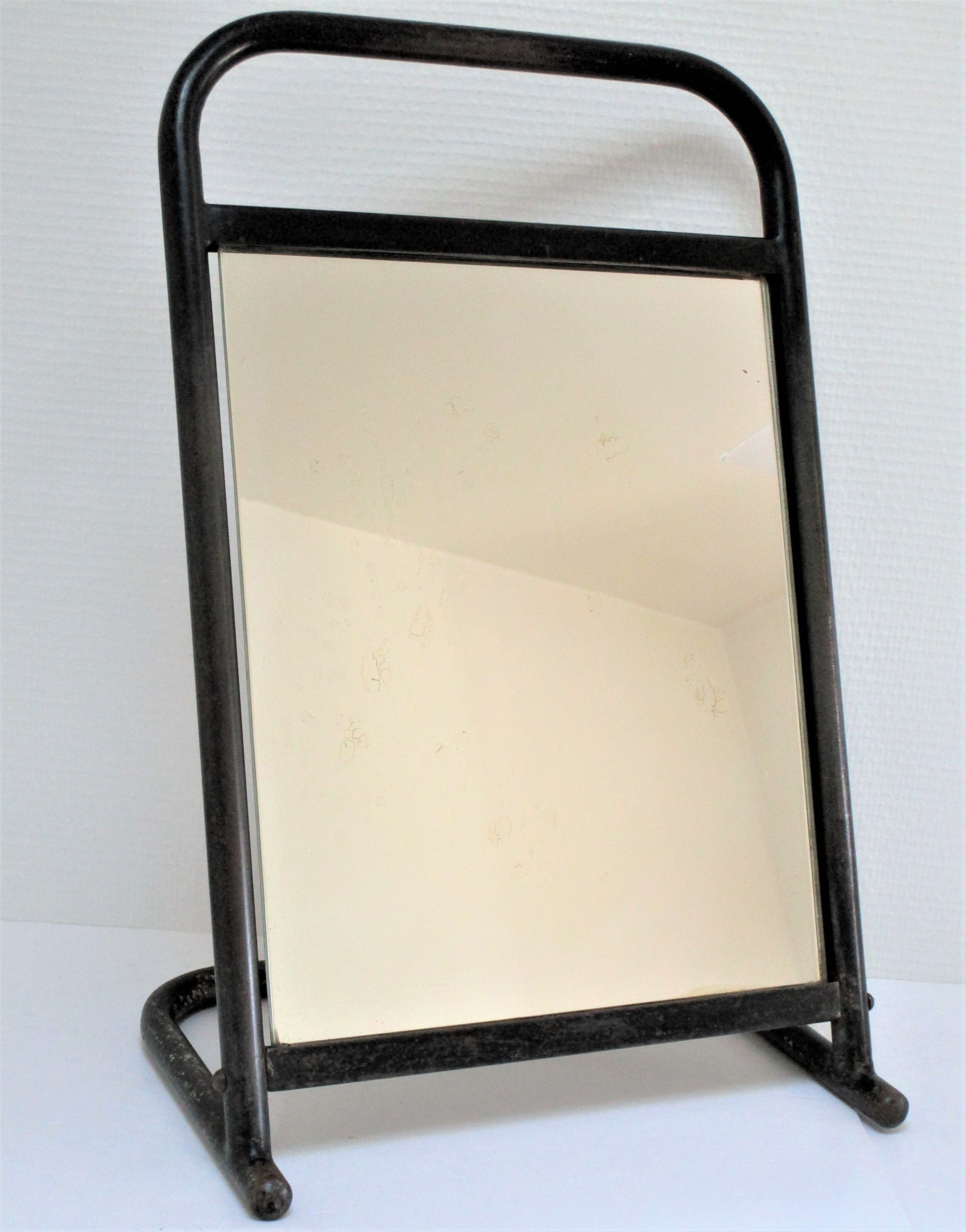 Vintage patinated metal shoe mirror