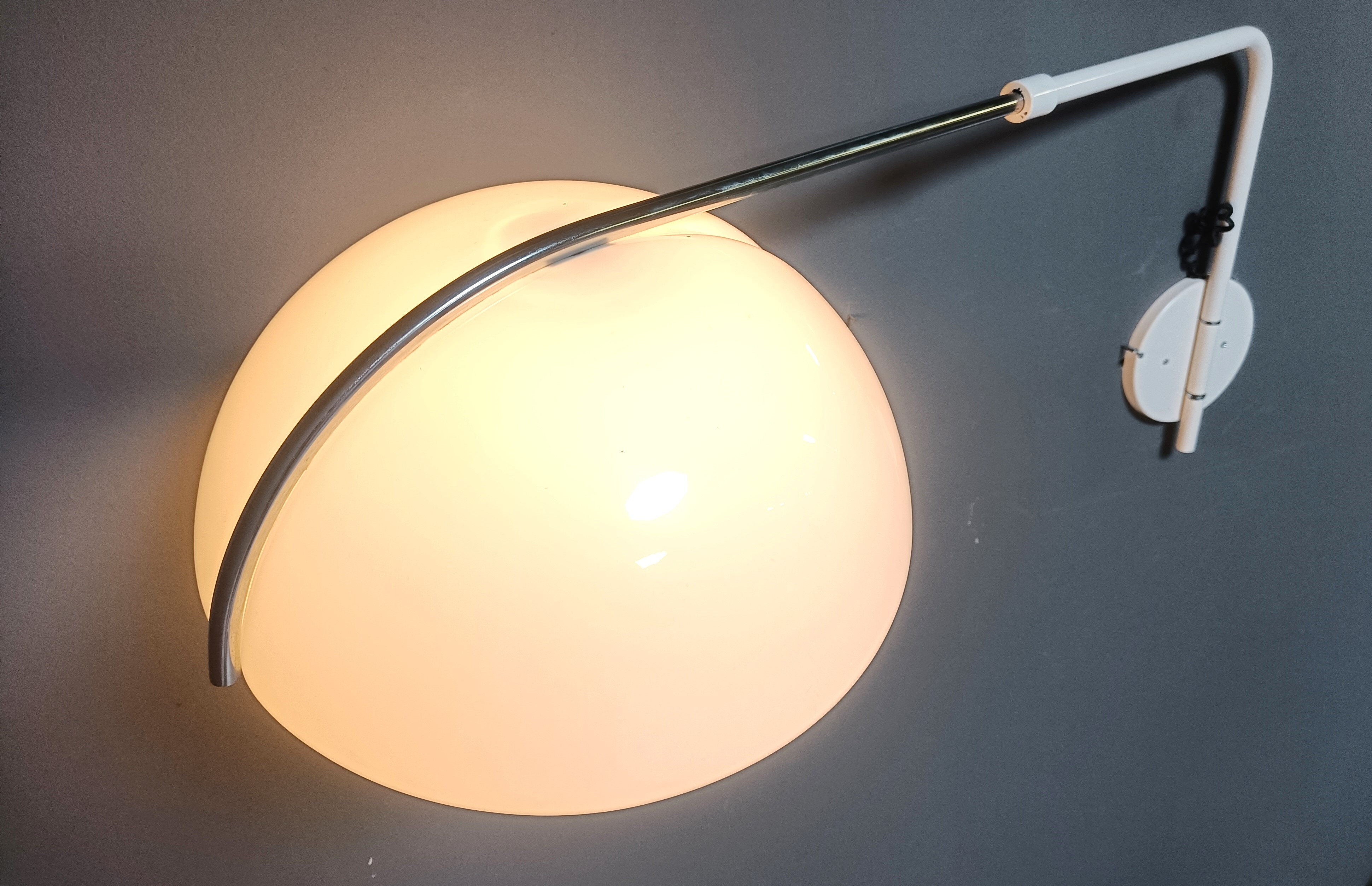 Vintage wall lamp by Luigi Massoni for Guzzini, 1970s
