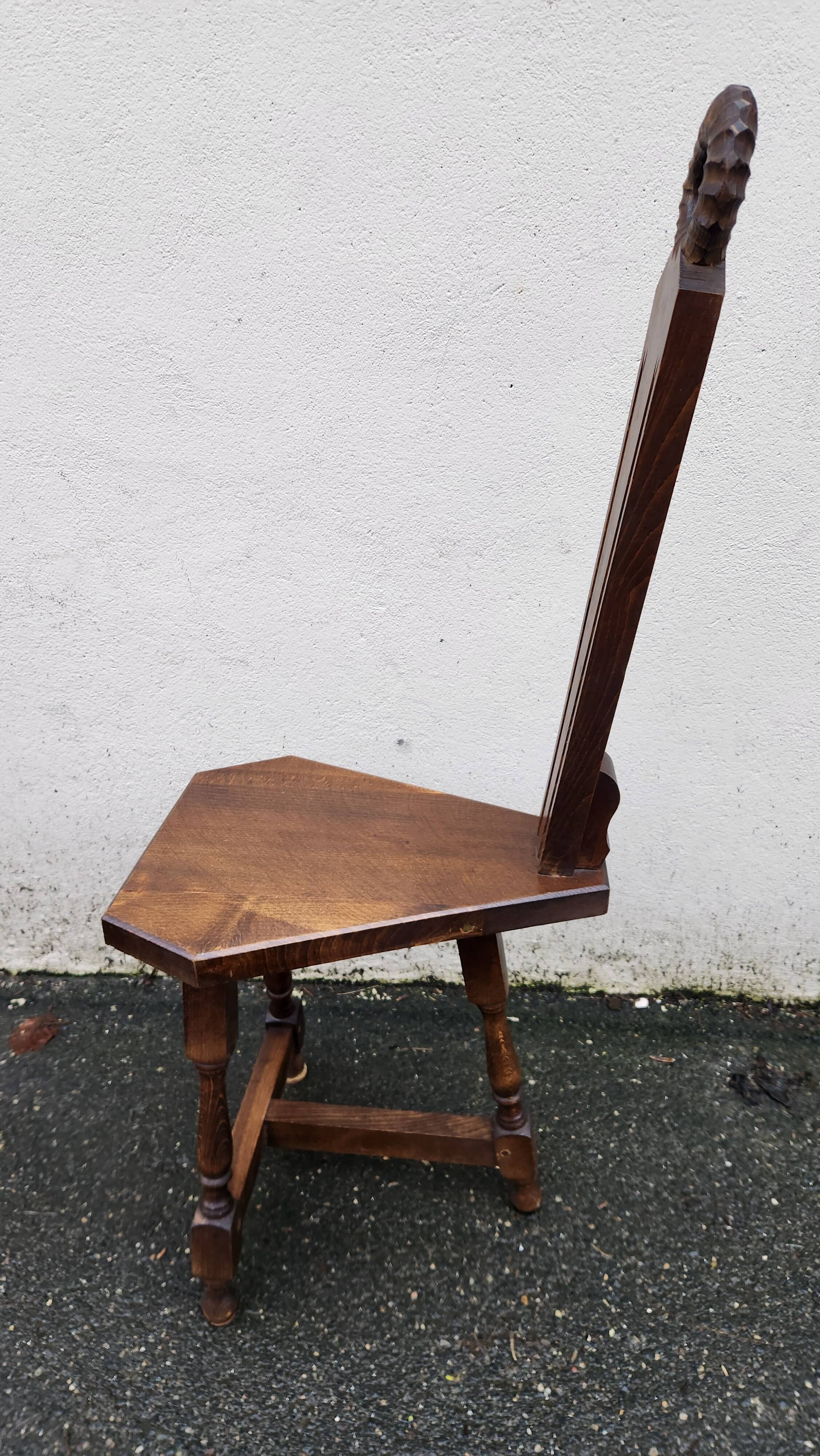 2 three-legged chairs made of solid wood