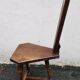 2 three-legged chairs made of solid wood