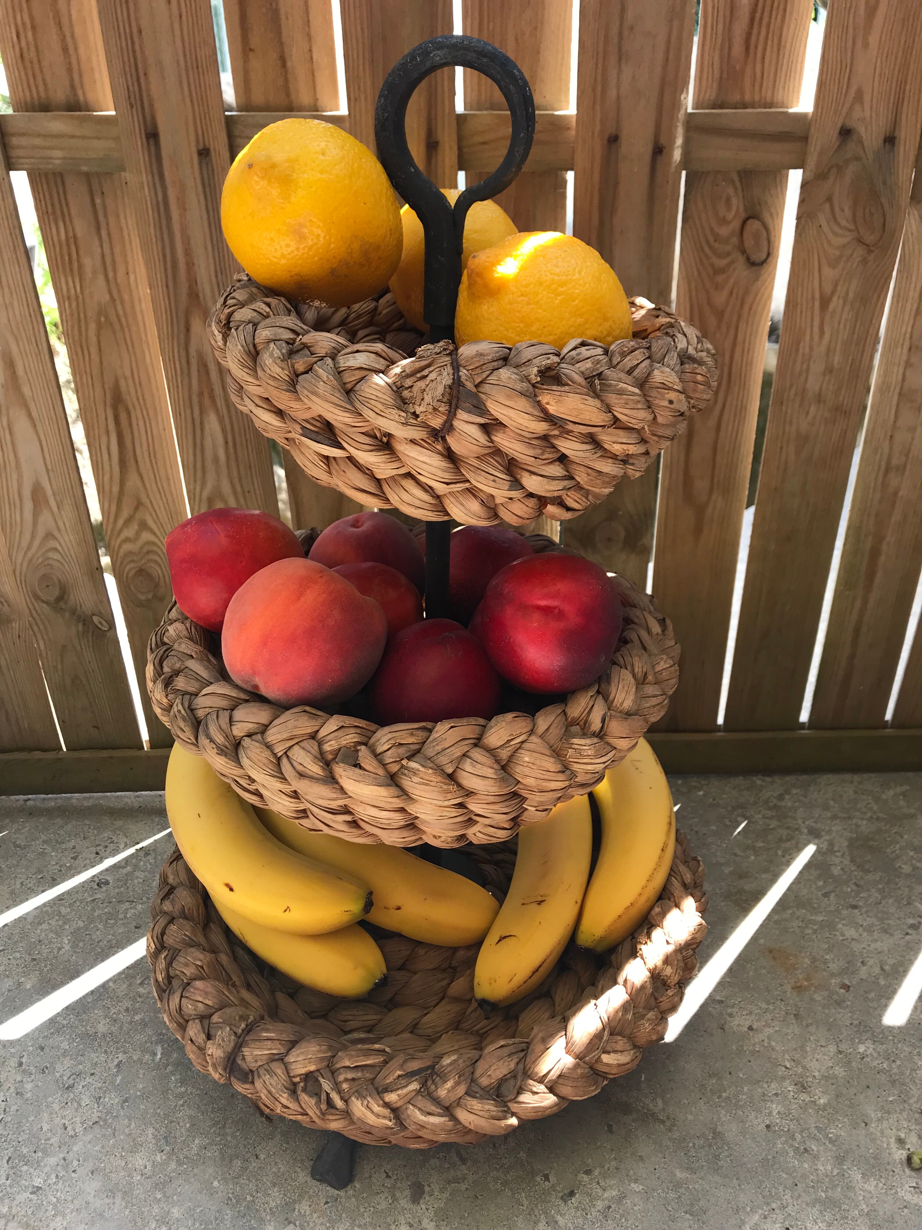 Fruit tray display in braided rope on 3 levels