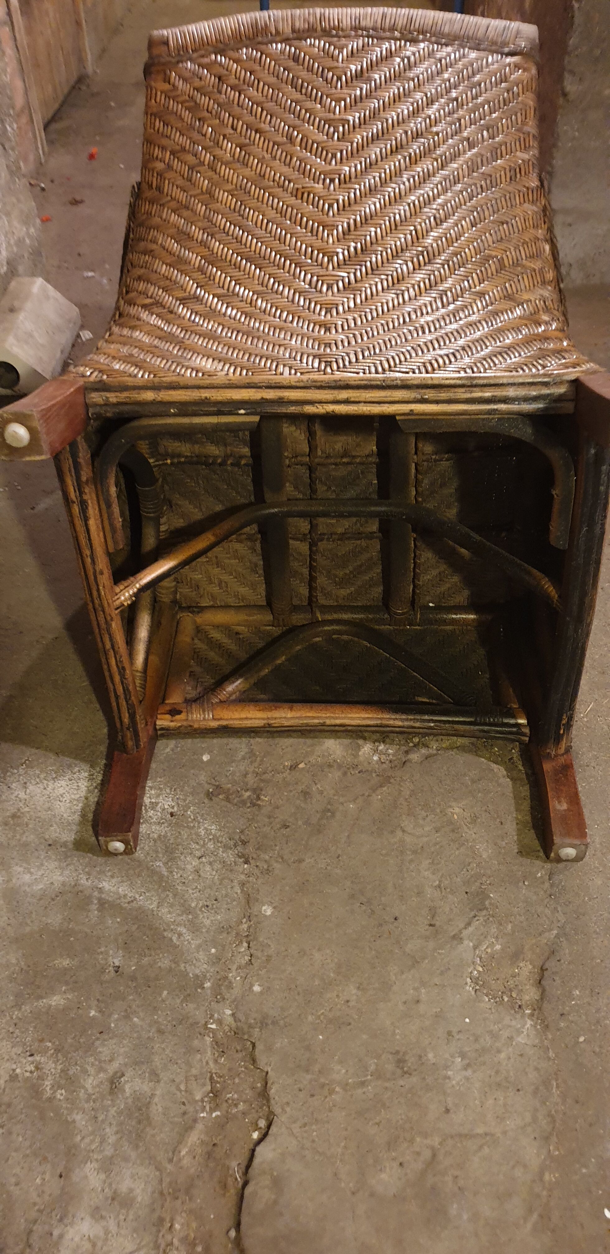 Rattan and wood armchair