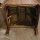 Rattan and wood armchair