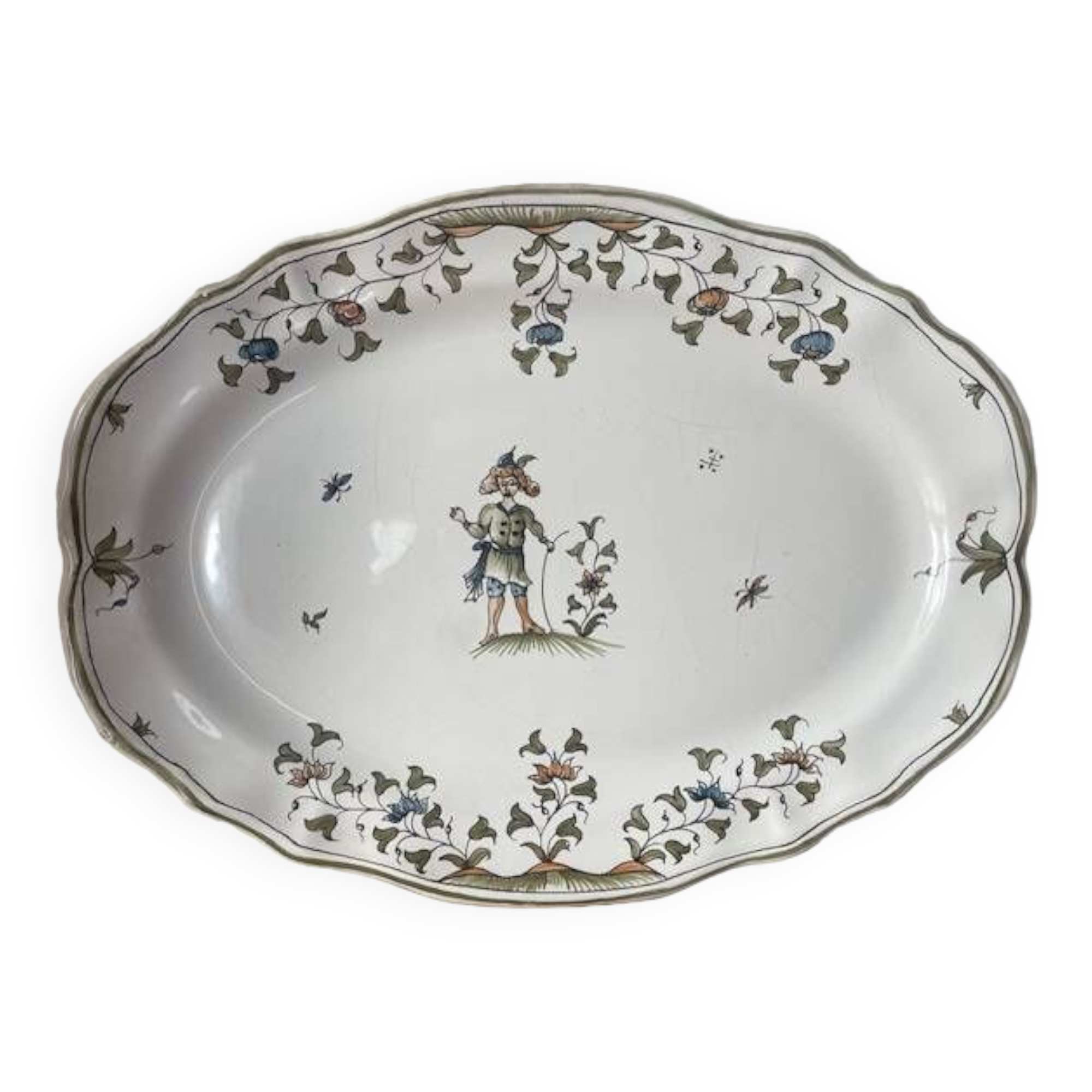 Large earthenware dish from Moustiers, signed Féret
