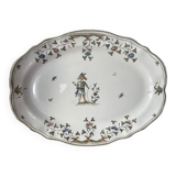 Large earthenware dish from Moustiers, signed Féret
