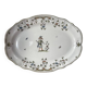 Large earthenware dish from Moustiers, signed Féret
