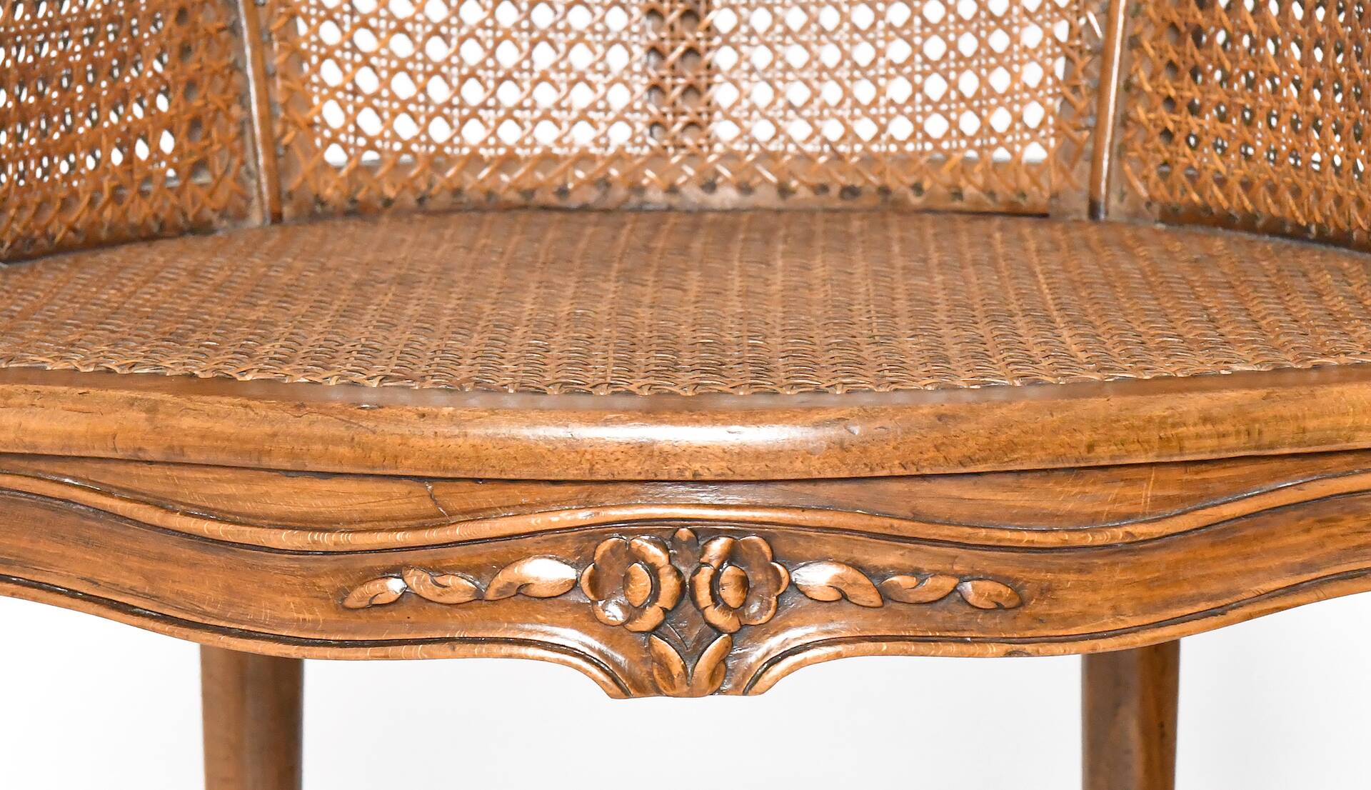 Louis XV style caned bergère armchair