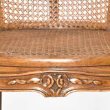 Louis XV style caned bergère armchair
