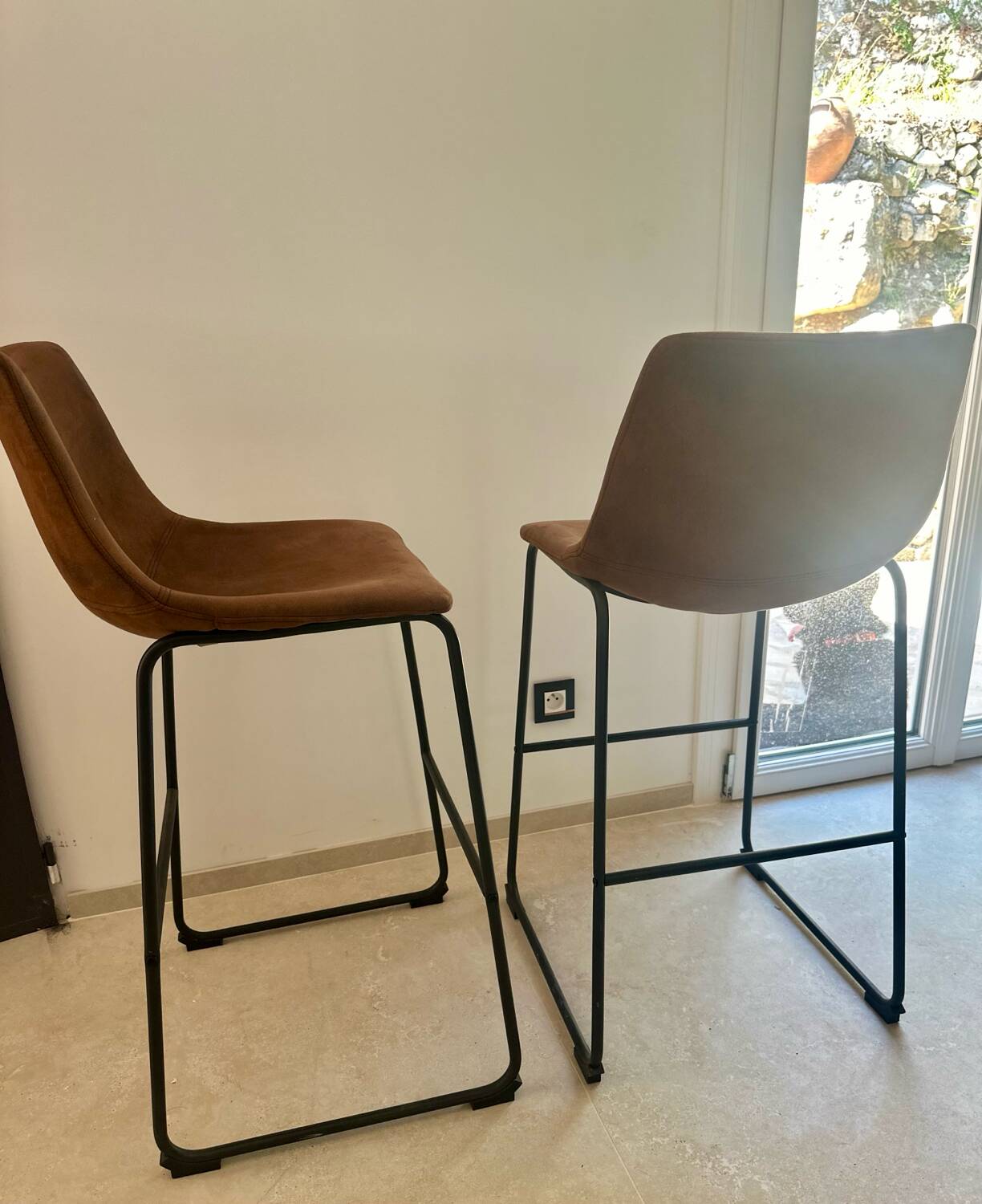 Bar stool in metal and aged leather