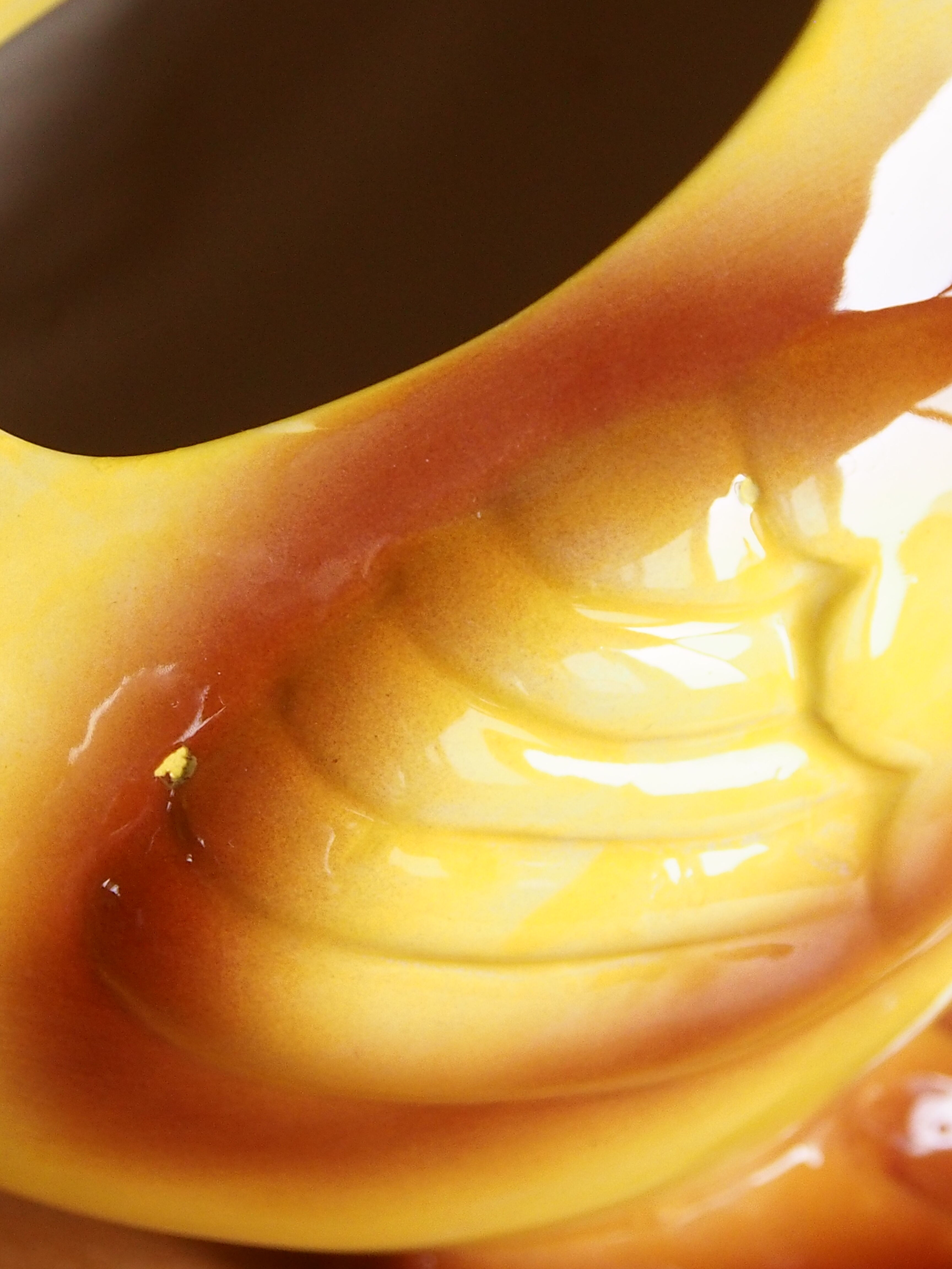 Ceramic watering can in white earthenware, yellow enamel and bird shape
