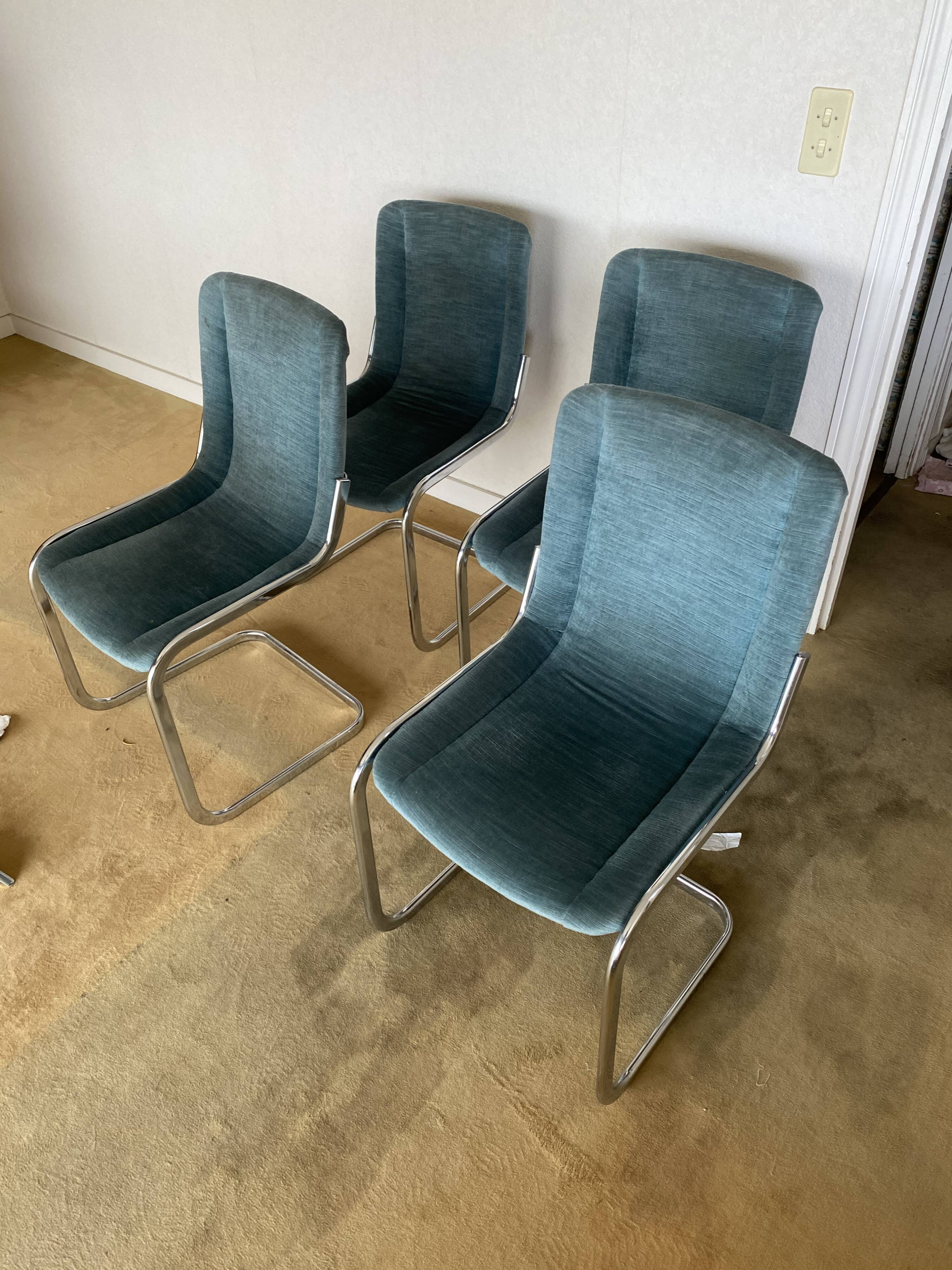 Set 4 steel design chairs and fabrics