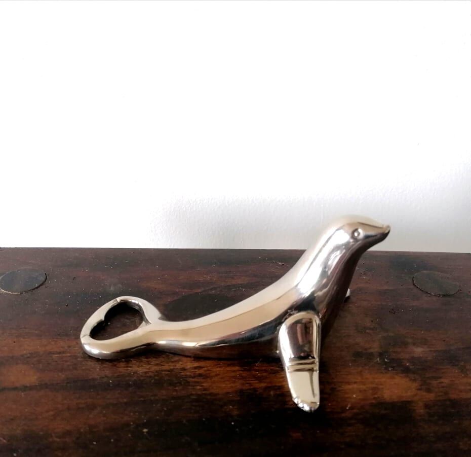 Silver metal seal bottle opener