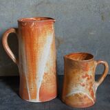 Duo of vintage glazed stoneware potter's pitchers