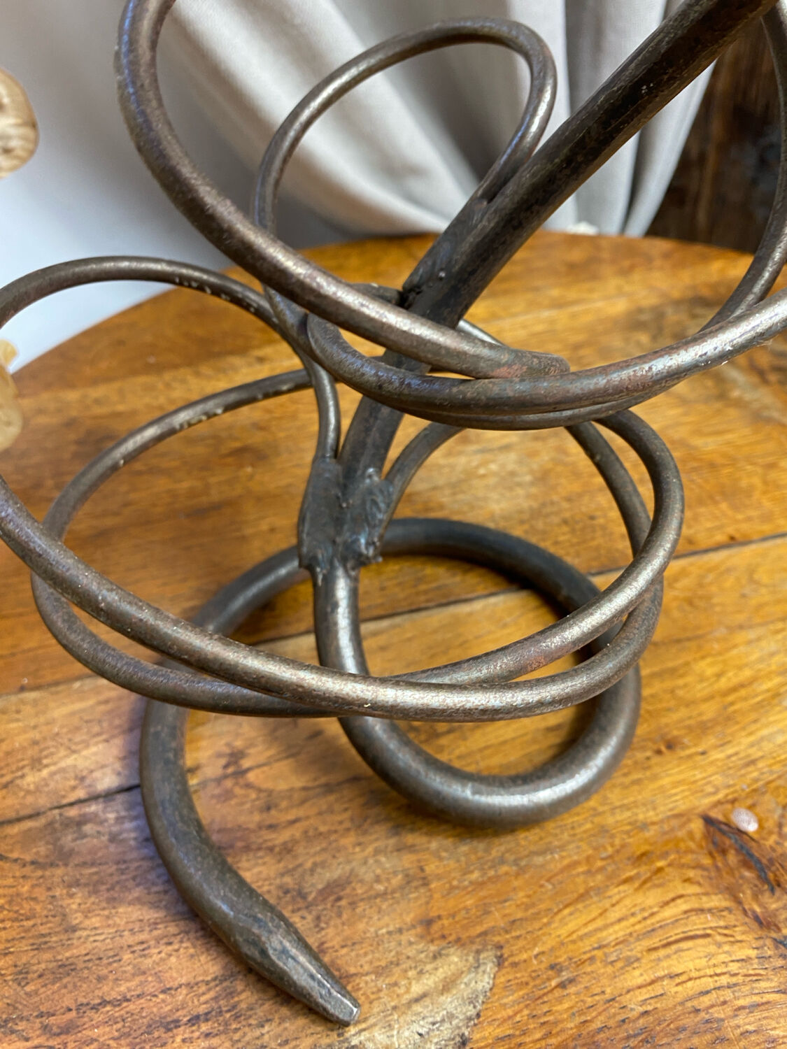 Triple-entwined iron chandelier