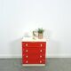 Vintage ladekast met rood roze kunststof lades 1970