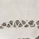 Net-style embroidered cotton tablecloth.