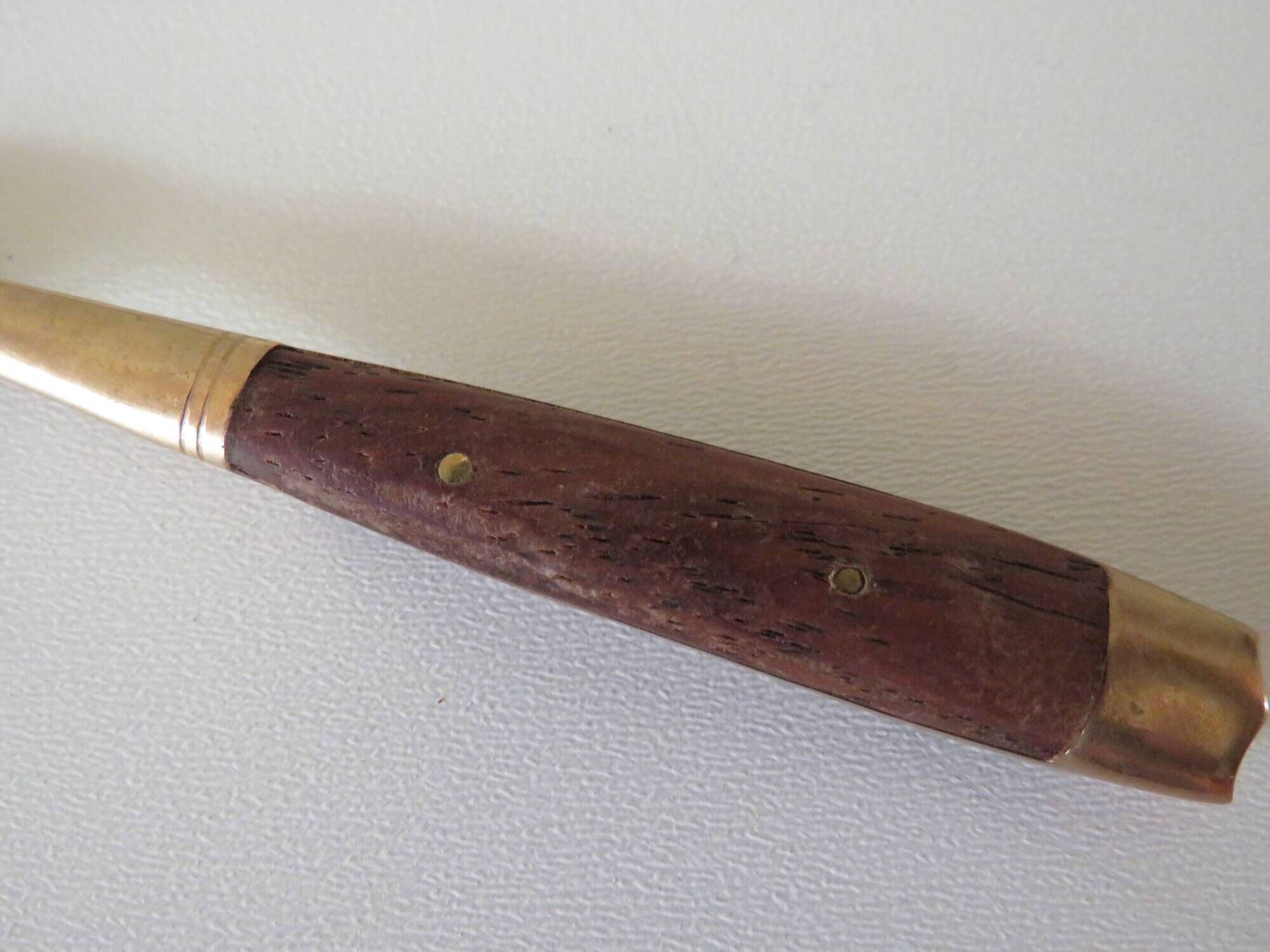 Vintage teak and brass housewife, dessert spoons and forks
