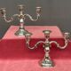 Pair of candlesticks. Silver-plated metal.