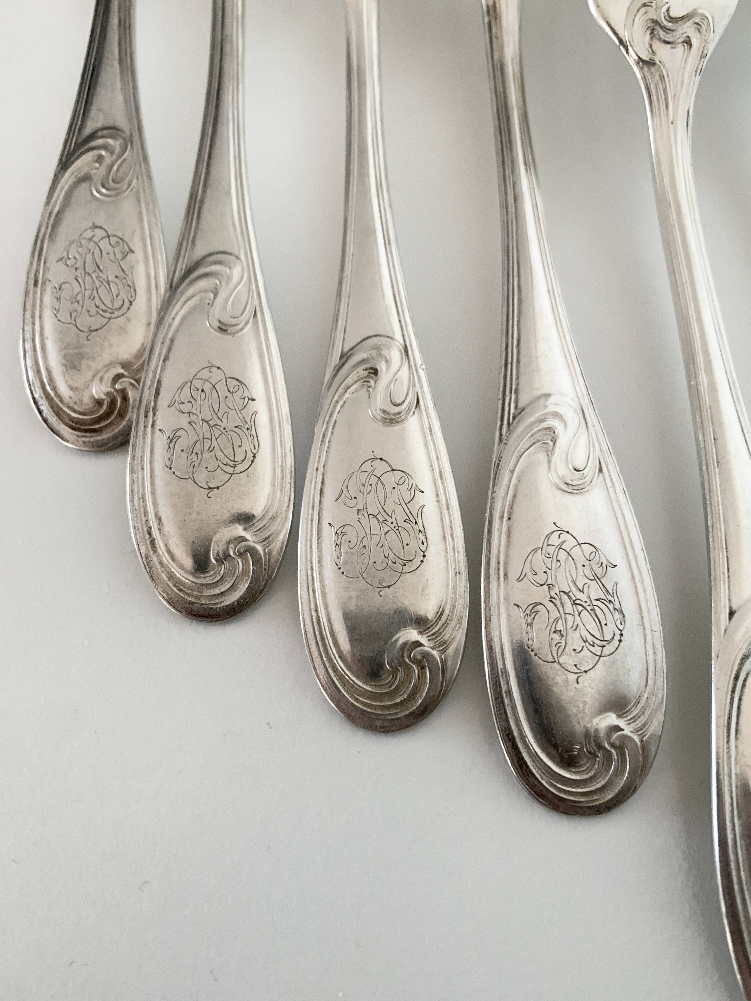 Nine large Ercuis silver-plated forks