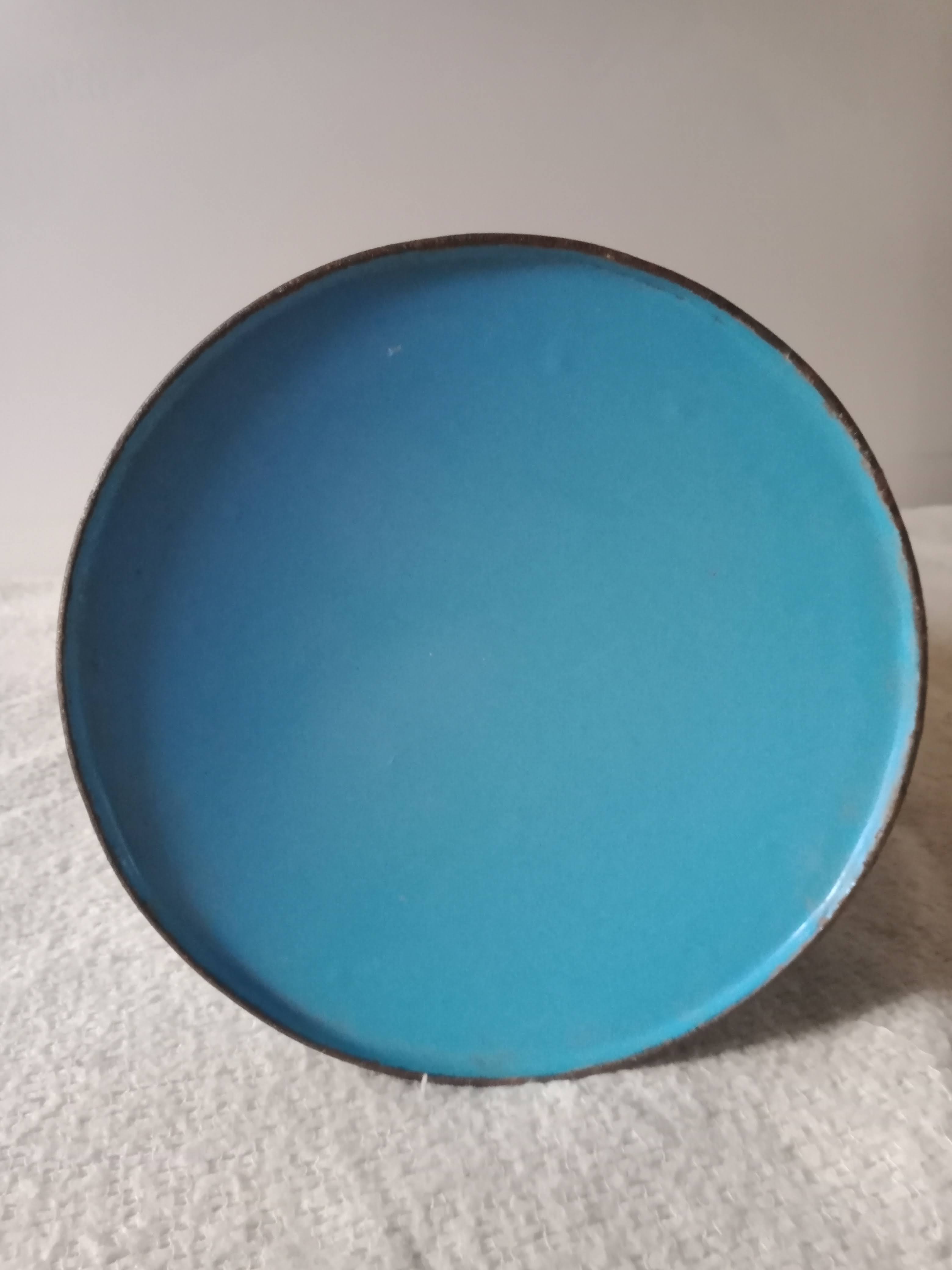 Old broc in blue enamelled sheet metal