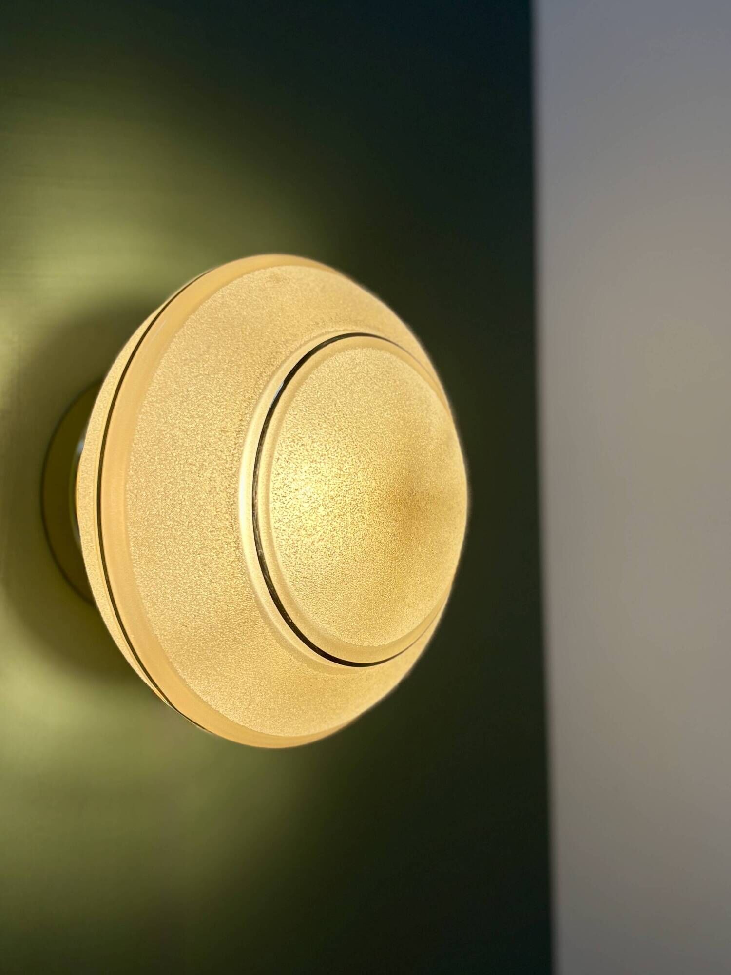 Vintage Art Deco globe wall/ceiling light in frosted yellow and gold glass.