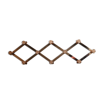 Mid-century Hollywood Regency-style wall-mounted coat rack