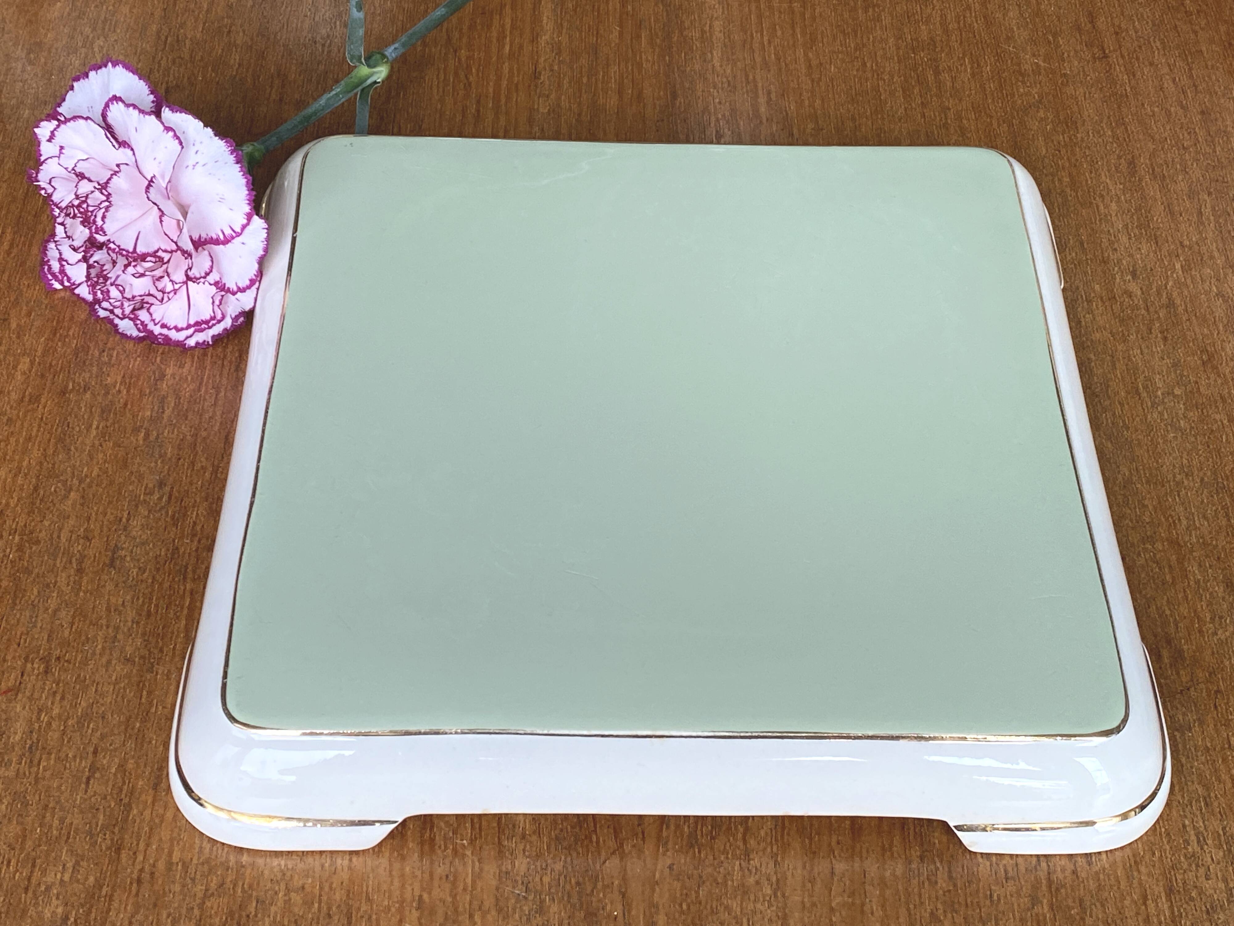 Important vintage trivet in celadon green faience by Villeroy & Boch.