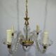 4-light glass and brass chandelier