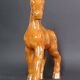 Ceramic horse sculpture with wild glaze and gold, signed Art Deco.