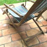 Pair of 19th-century wooden deck chairs with pegged frames and wrought iron