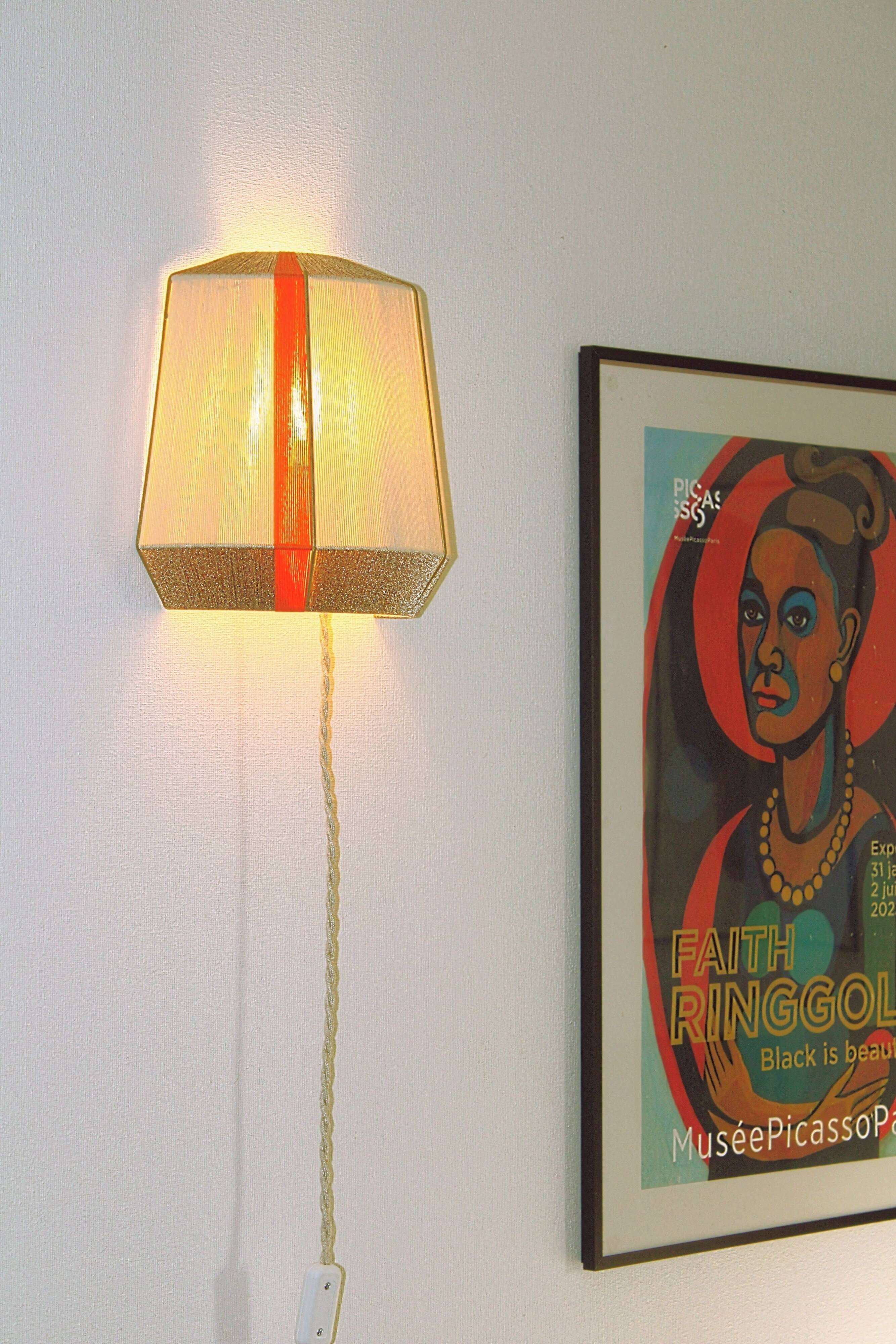 Colourful wall lamp L’Epicurienne gold – orange
