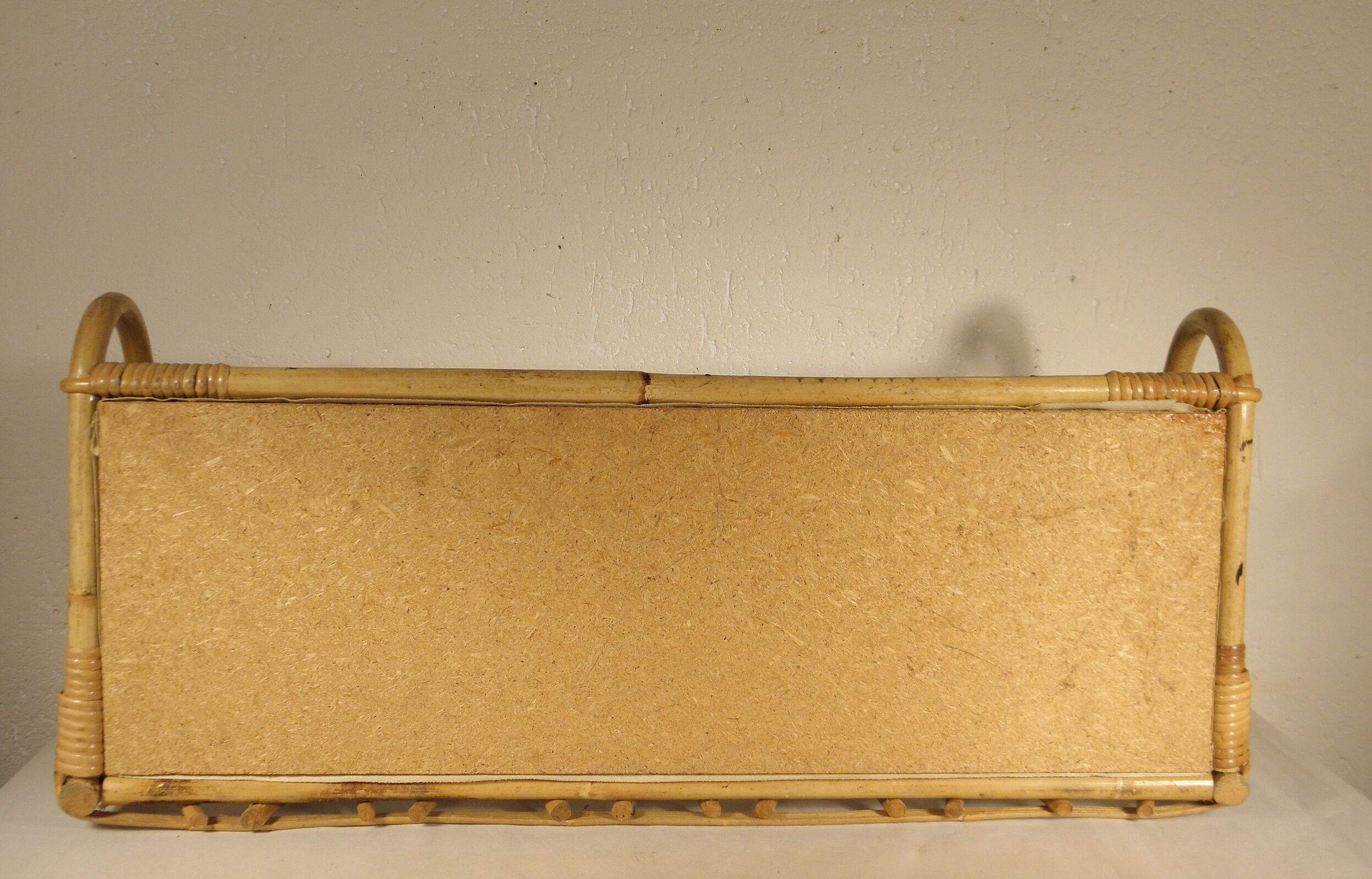 Rattan wall shelf