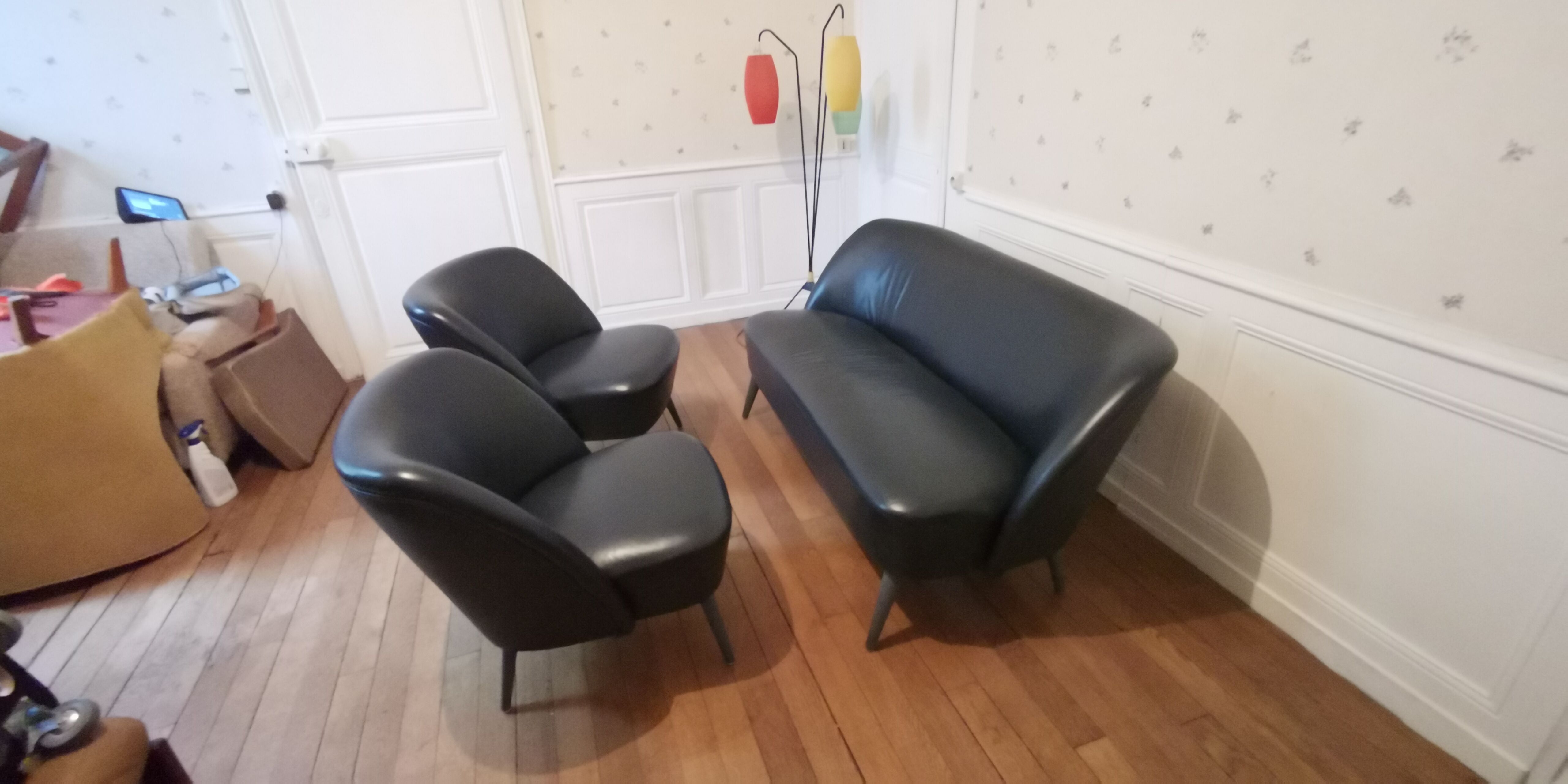 Living room sofa 2 black leather armchairs
