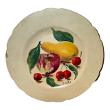 Faience plate in Longwy enamels signed Léa Valenti representing Fruits