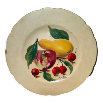 Faience plate in Longwy enamels signed Léa Valenti representing Fruits
