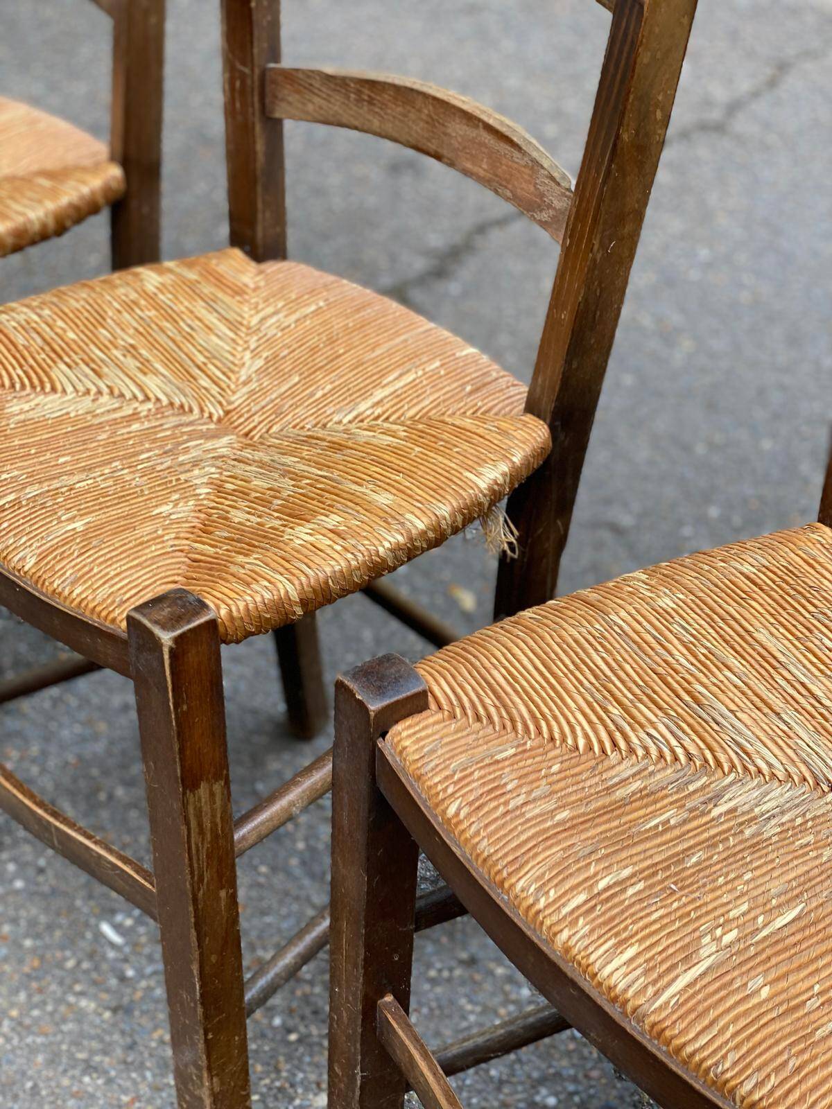 3 solid wood and straw chairs