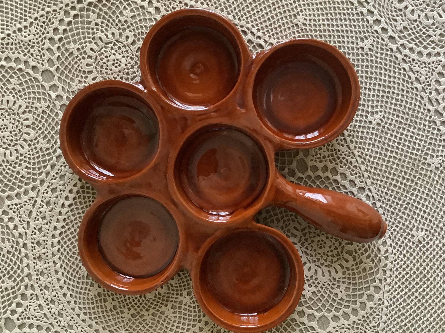 Brown clay appetizer dish