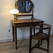 Antique beveled octagonal vanity mirror in carved wood