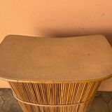 Vintage rattan bar from the 60s with rounded shapes and a shelf for glasses
