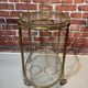 Glass and metal trolley, contains 4 bottle holders