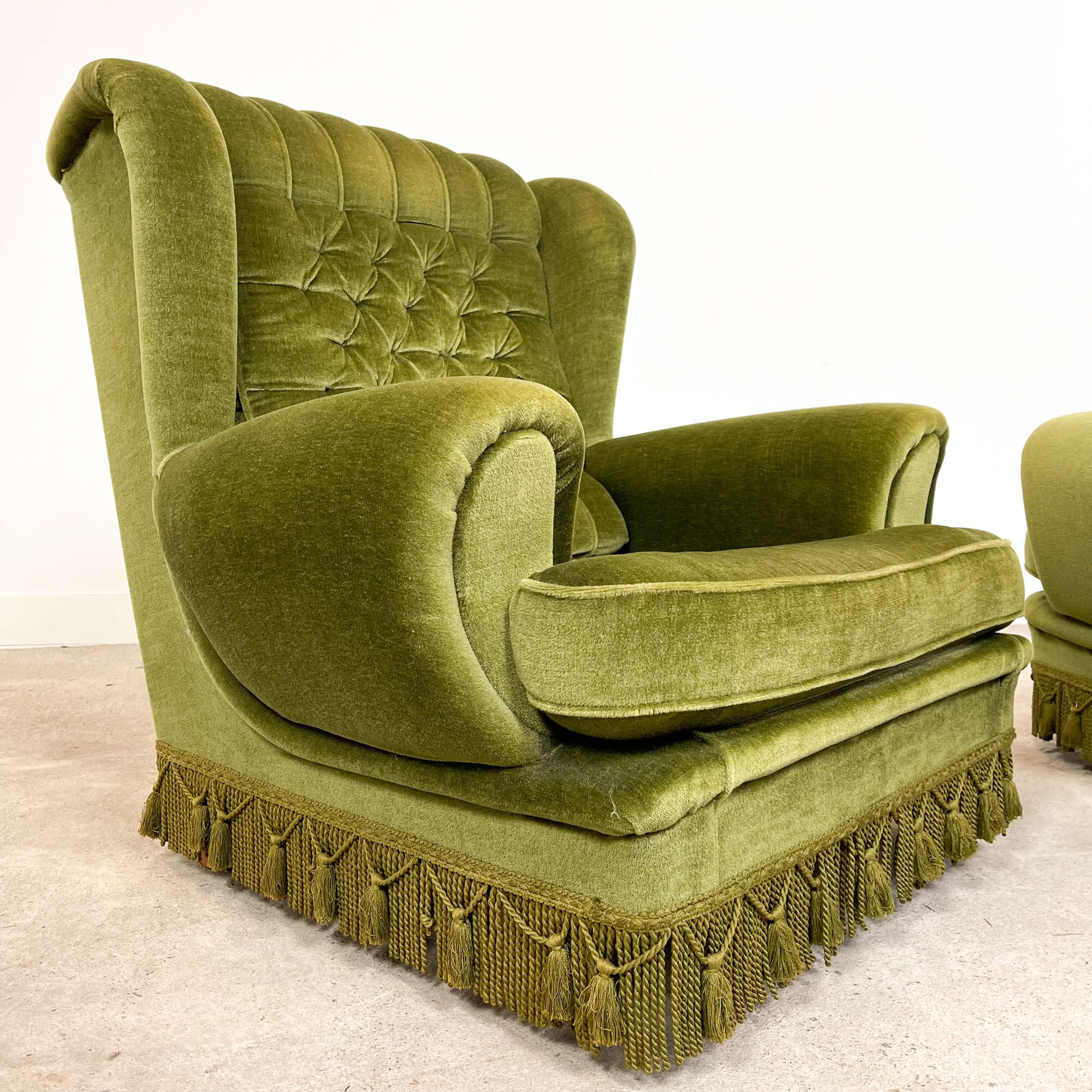 Set of two vintage original green velvet armchairs