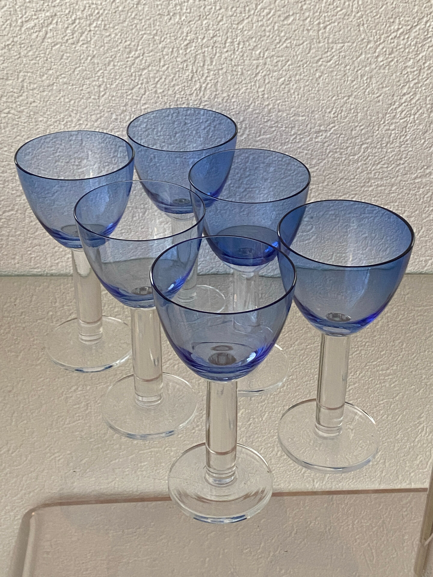 Six two-coloured wine or cocktail glasses.