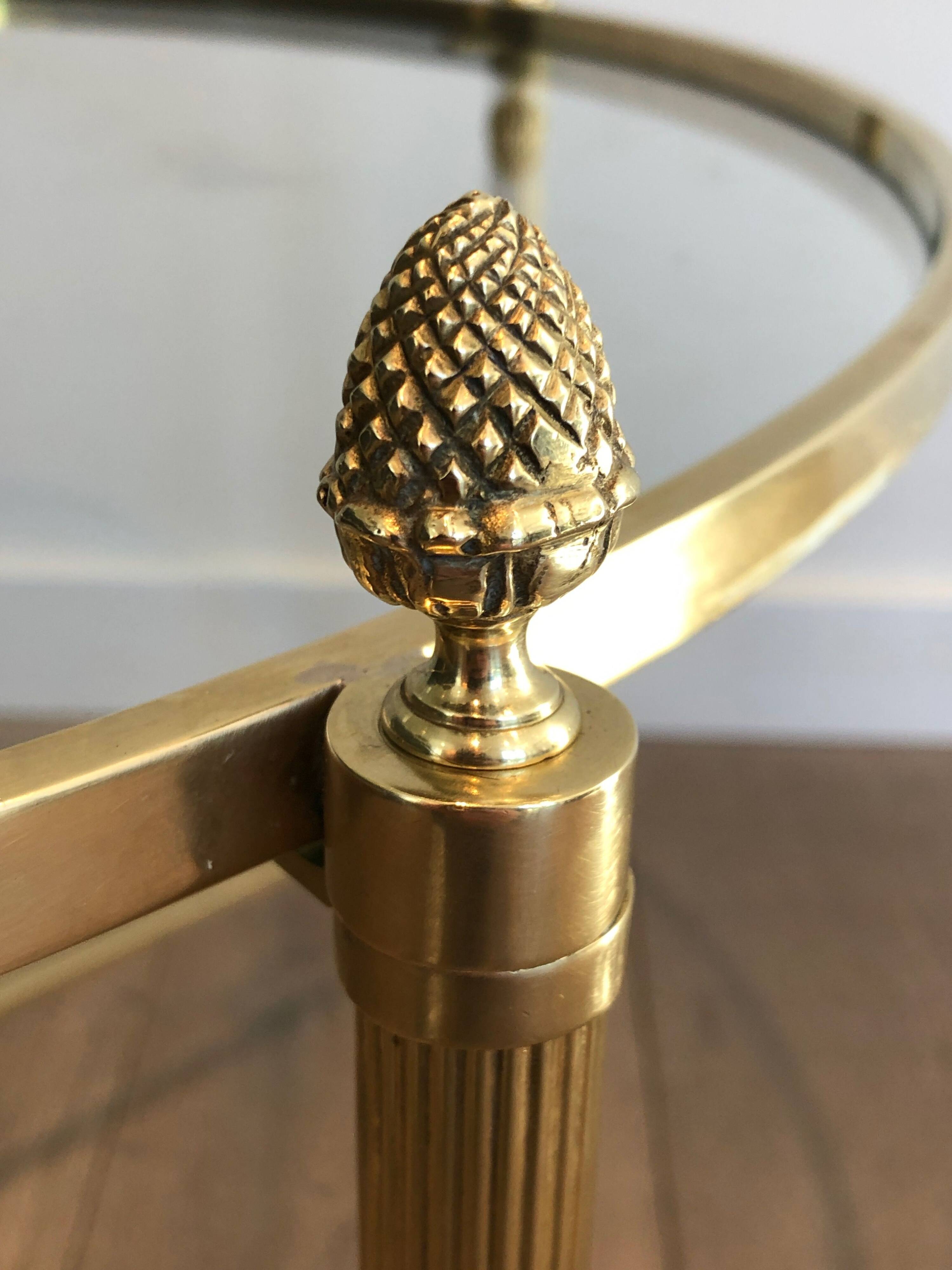 Round brass coffee table. Maison Baguès