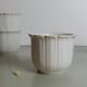 Set of 4 white ceramic cups