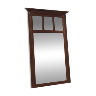 Antique beveled mirror on a wooden frame, 1930