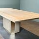 Dining table in travertine and brass. French work. Around 1970.