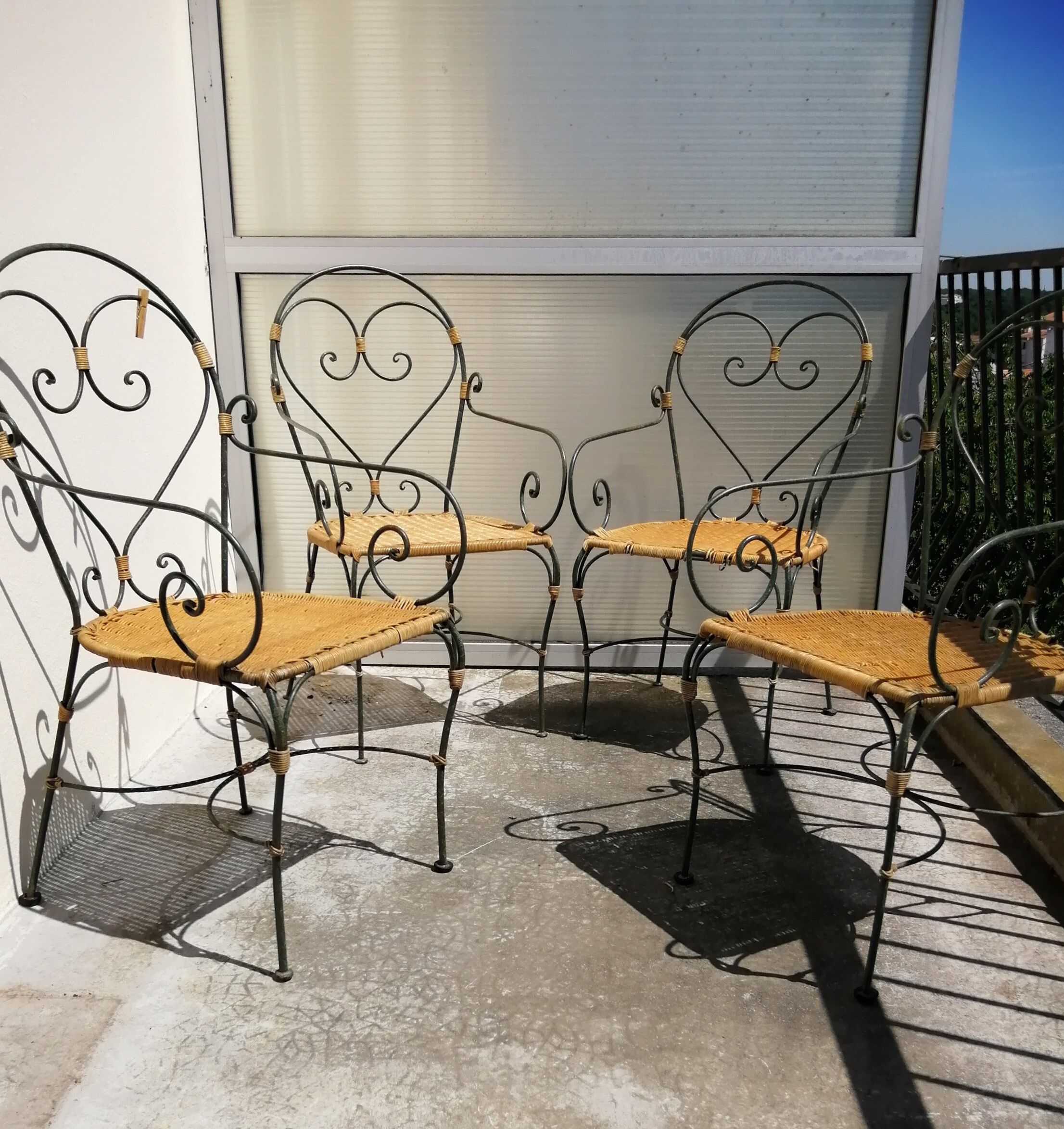 rattan chair and wrought iron